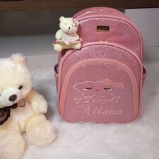 Produção de Mochila Rosa Impermeável
